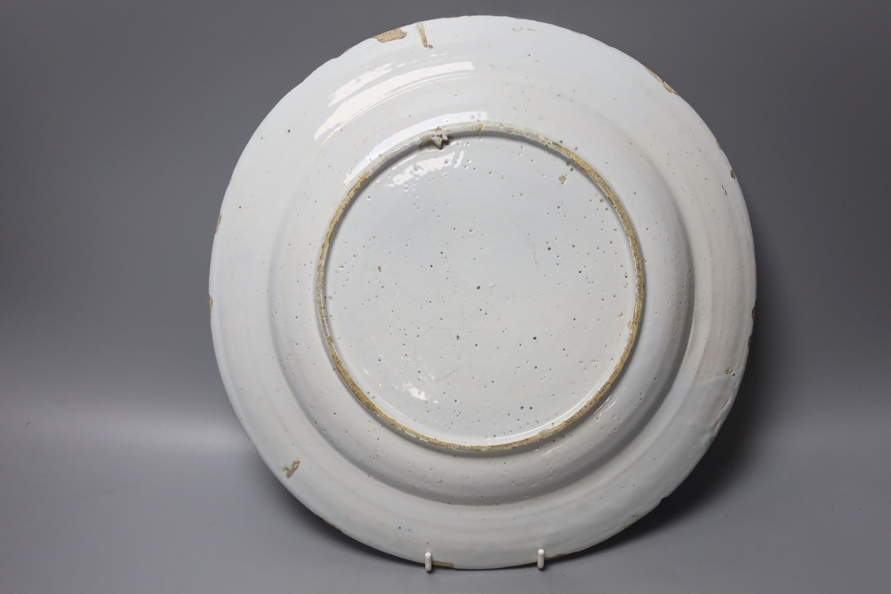 An 18th century Delft blue and white dish 34cm